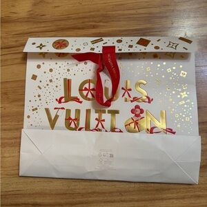 Louis Vuitton White Gift Bag with Gold Foil and Red Ribbon
